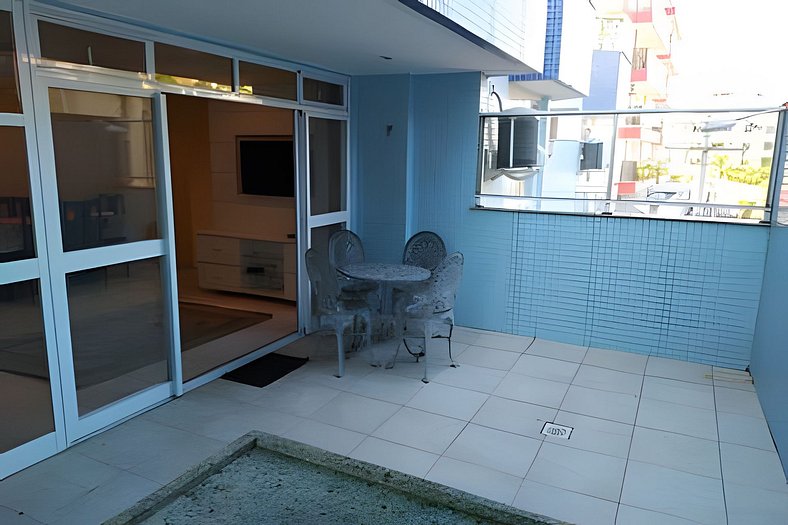 Covered apartment with barbecue gourmet area, ample space.